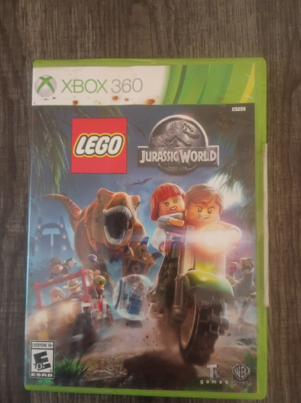 Lego Jurassic World Video Game Case with Blue and Green Artwork